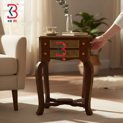 Wooden side table with decorative elements in a room setting, featuring the KB Art logo.