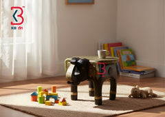 Children's stool elephant design in a room with toys and books