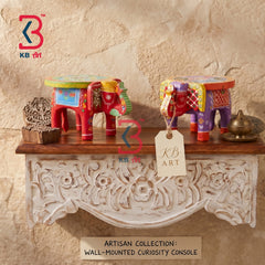 Detailed macro view highlighting the intricate hand-carved floral medallions and vine patterns on the white-washed distressed apron of the wooden floating shelf.