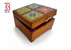 A square wooden box with a hinged drawer, featuring a colorful mosaic tile pattern on the lid and brass-tone hardware, shown on a white background with a KB Art logo watermark.