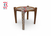 KB ART round wooden side table with hand-painted white floral vine patterns on a dark wood base.