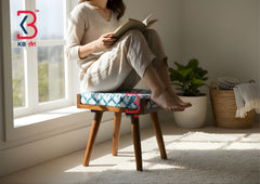 Side view showing the folding X-frame mechanism of the KB ART hand-painted wooden stool.
