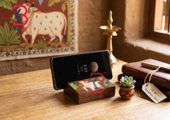 KB ART Hand Painted Wooden Mobile Stand Cow Art - Close-Up of Hand-Carved Artisan Texture - Handcrafted Wooden Decor Jodhpur