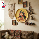 Round wooden wall plate with hand-painted Radha Rani playing flute, peacock feather crown, on golden yellow Pichwai background