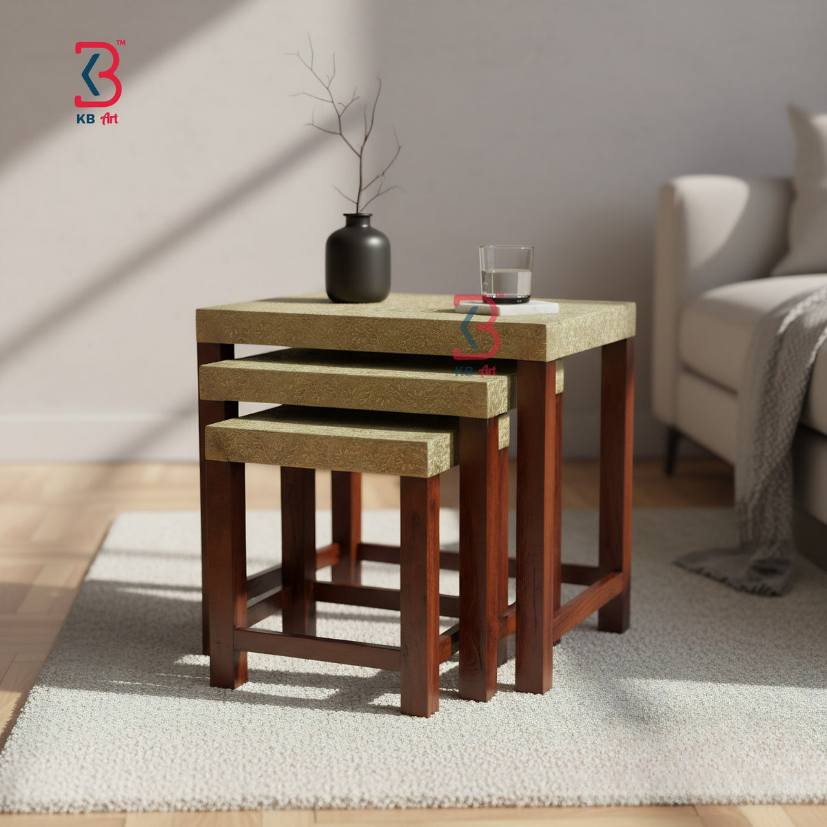 Set of three wooden nesting tables with a vase and glass on top in a living room setting.