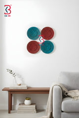 Circular hand-carved wooden wall plate with mandala pattern close-up