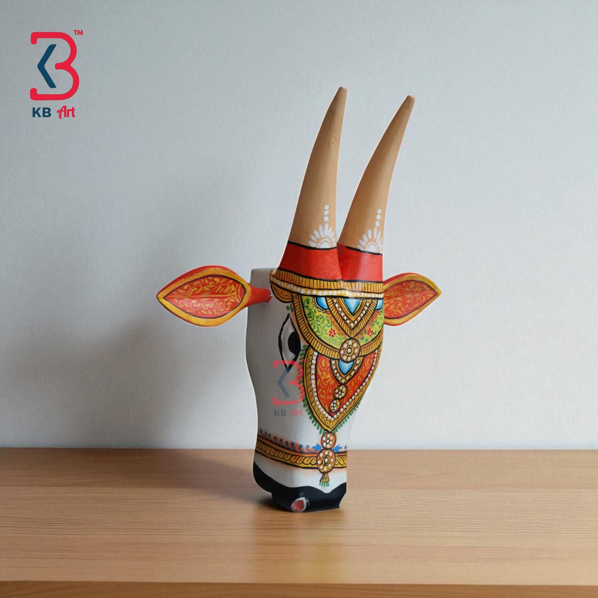 Artistic wooden bull head sculpture, perfect for cultural or bohemian home decor.