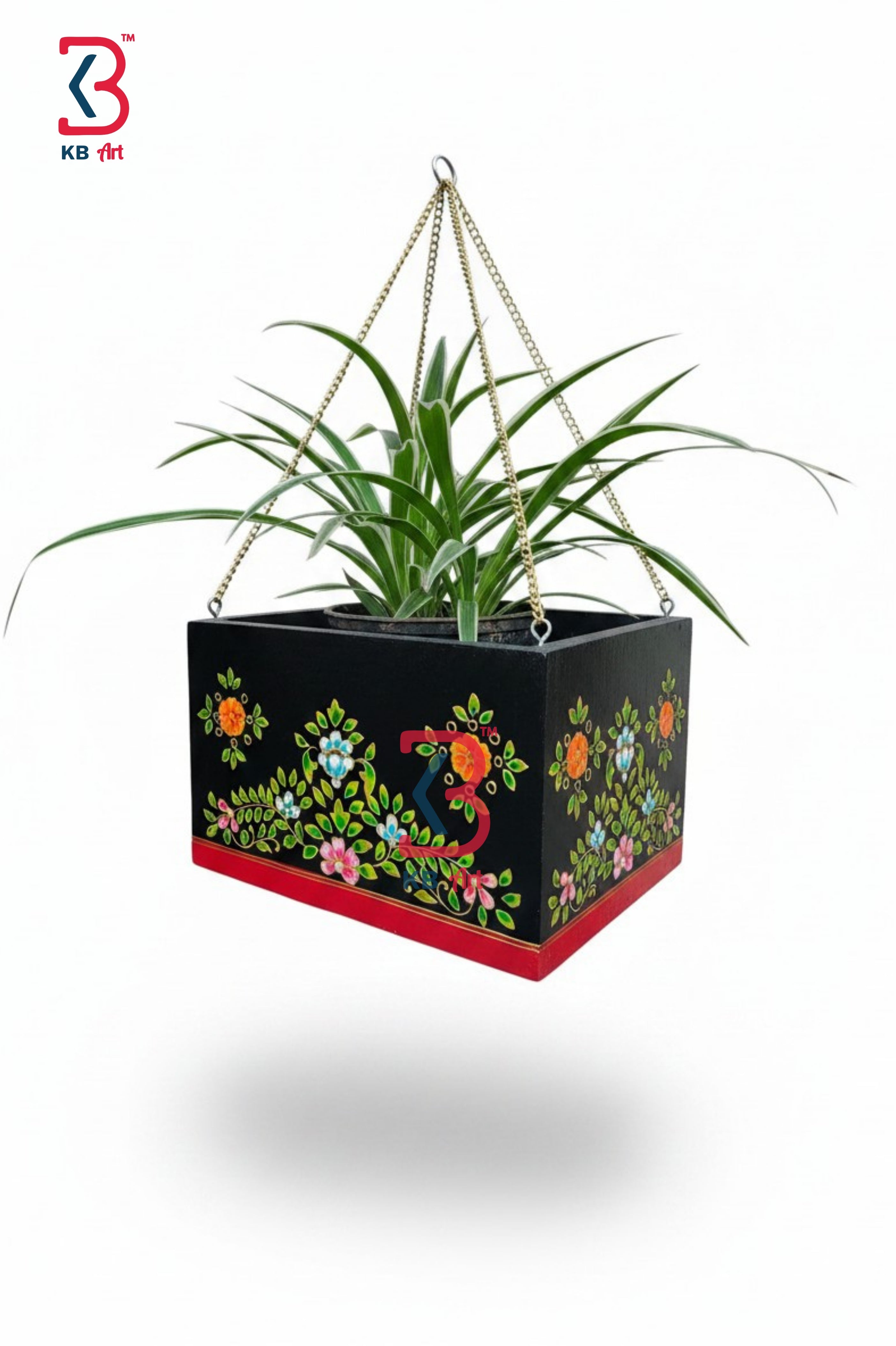 Decorative hanging planter with floral patterns on a white background