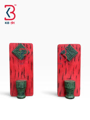 Two matching red and green decorative wall hooks shaped like rectangular panels with a diamond emblem and a small cylindrical base, shown on a light gray background. A KB art logo appears in the top-left corner.