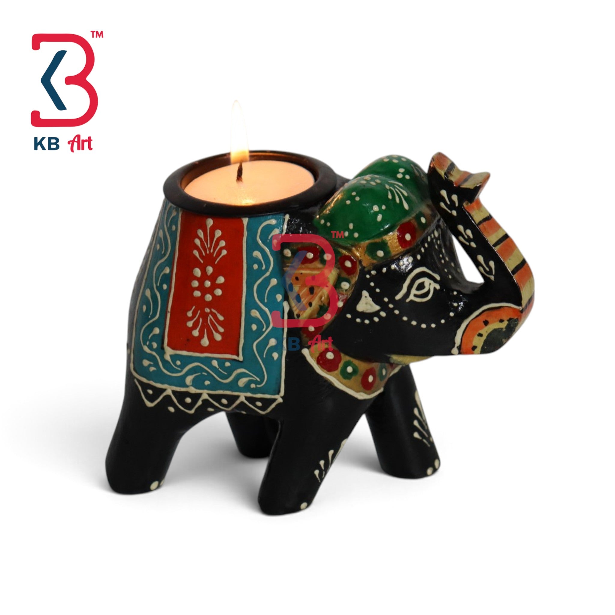 A decorative elephant-shaped candle holder with a lit tealight candle inside. The elephant is painted primarily black with colorful hand-painted patterns in green, red, blue, and orange.
