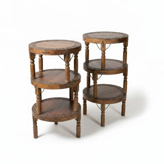 Set of three round wooden nesting side tables with three tiers each, featuring turned legs and decorative beaded trim around the circular shelves, shown on a white background.