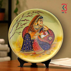 KB ART 12x12 Inch Round Handpainted Wooden Pichwai Wall Plate  – Traditional Rajasthani Lady Writing on Book – Cream Base Wall Decor