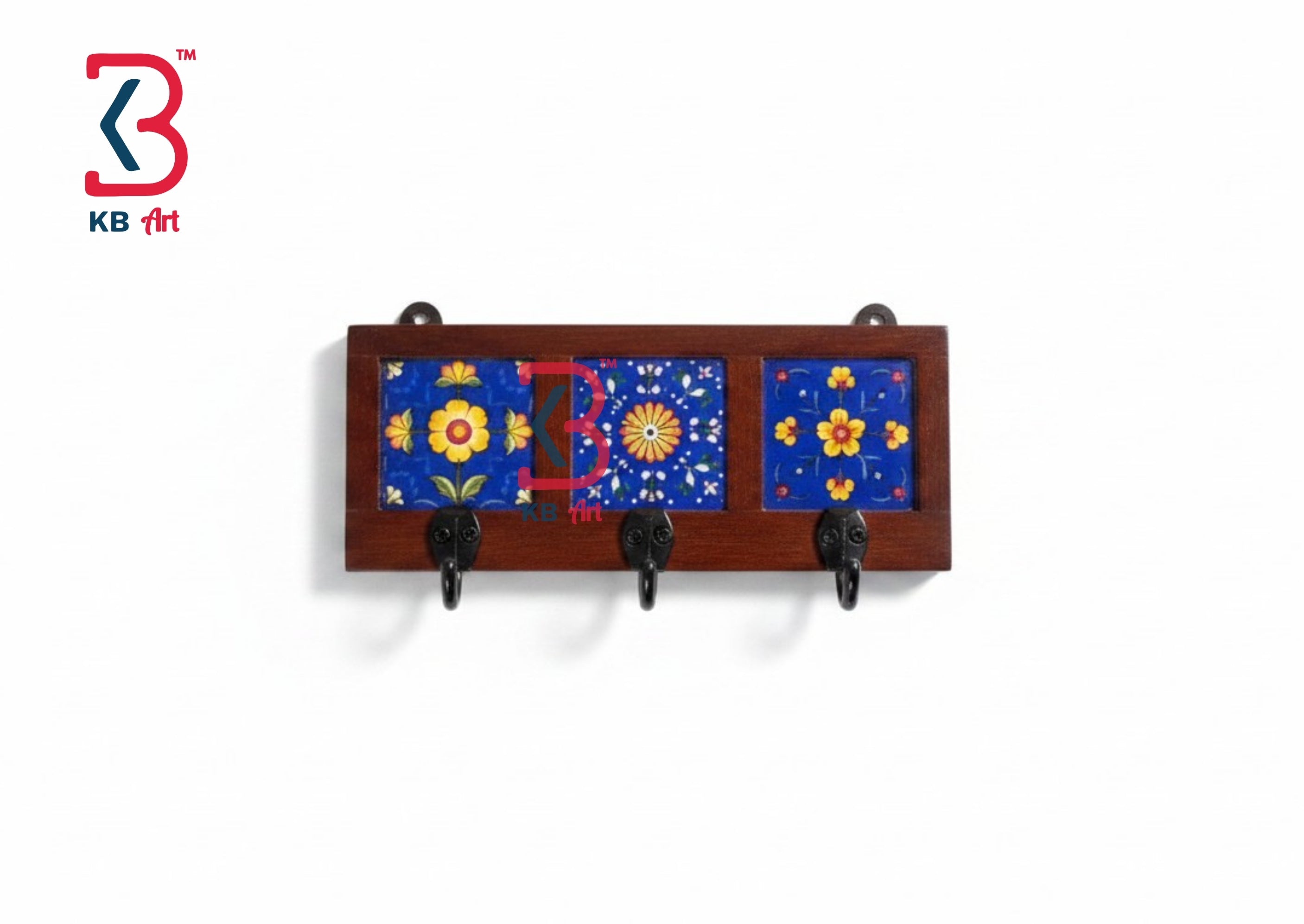 A rectangular wooden wall rack with three hanging hooks and three blue decorative tile panels featuring yellow and red floral patterns, shown against a plain white background.