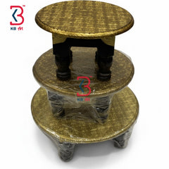Three-tiered round table with textured surface and plastic wrap on a white background, featuring the KB Art logo.