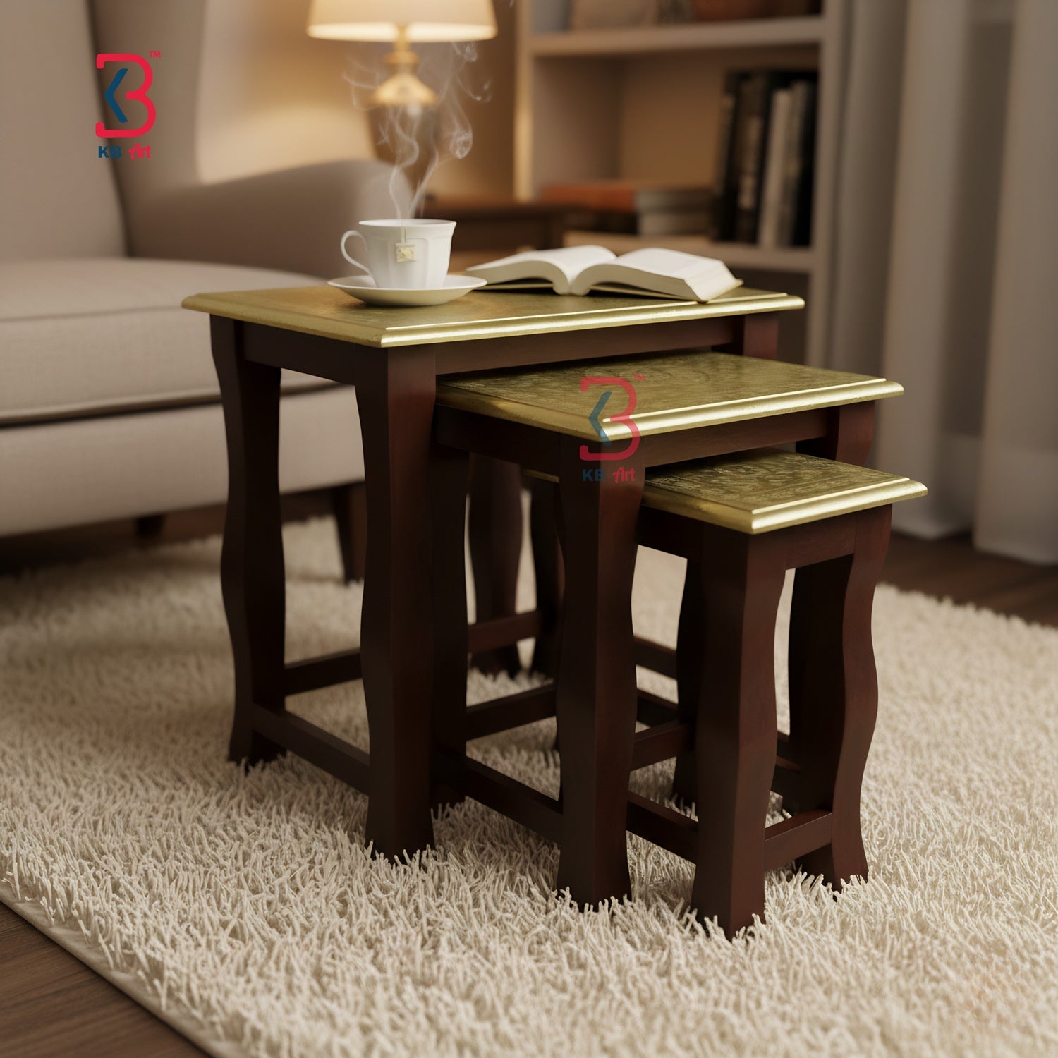 Set of three wooden nesting tables with gold leaf accents in a living room setting.