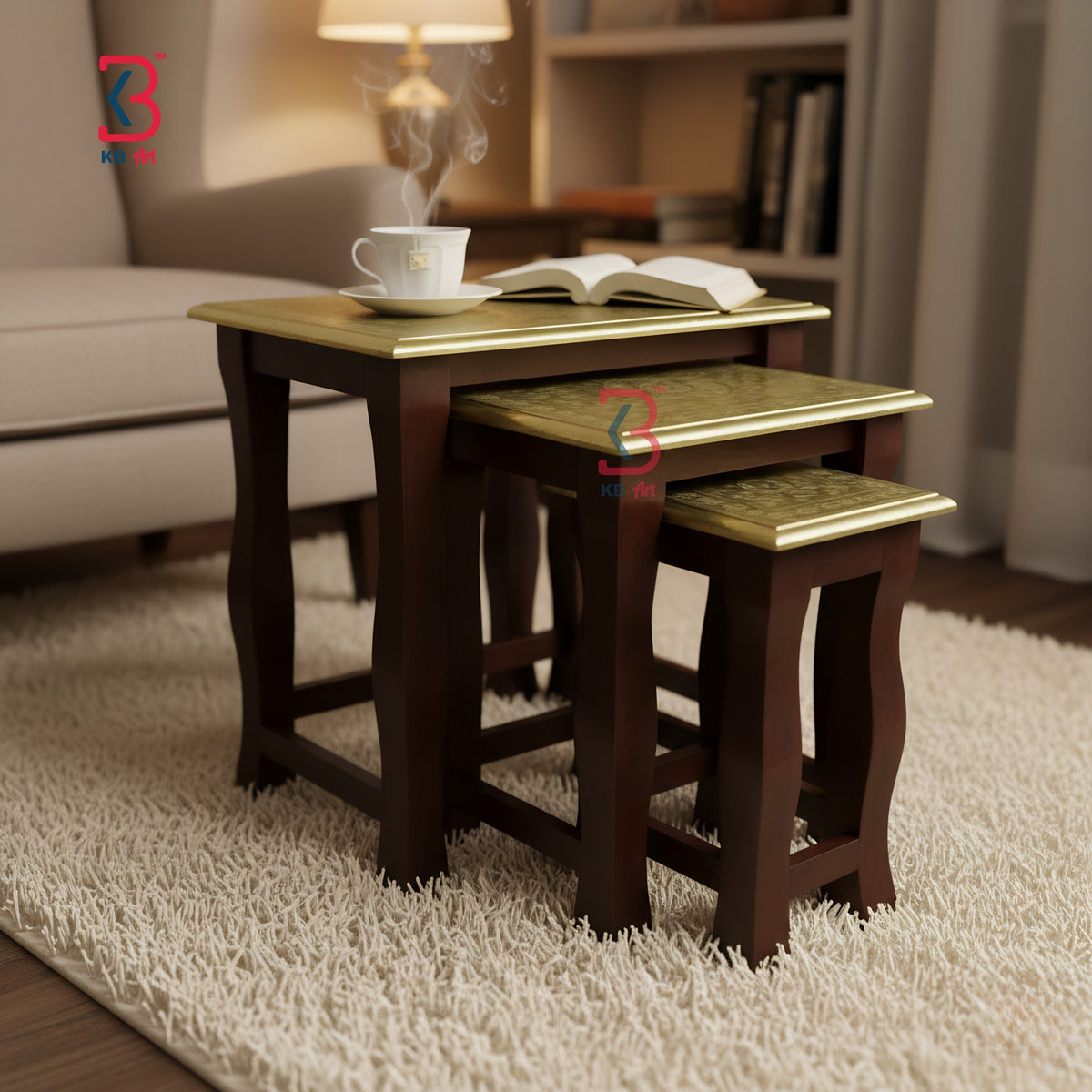 Set of three wooden nesting tables with gold leaf accents in a living room setting.