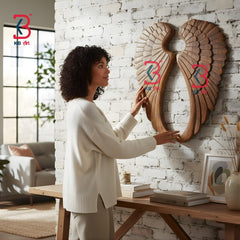 KB ART premium pair of hand-carved wooden angel wings wall art showing the symmetrical left and right textured feather panels on a white background.