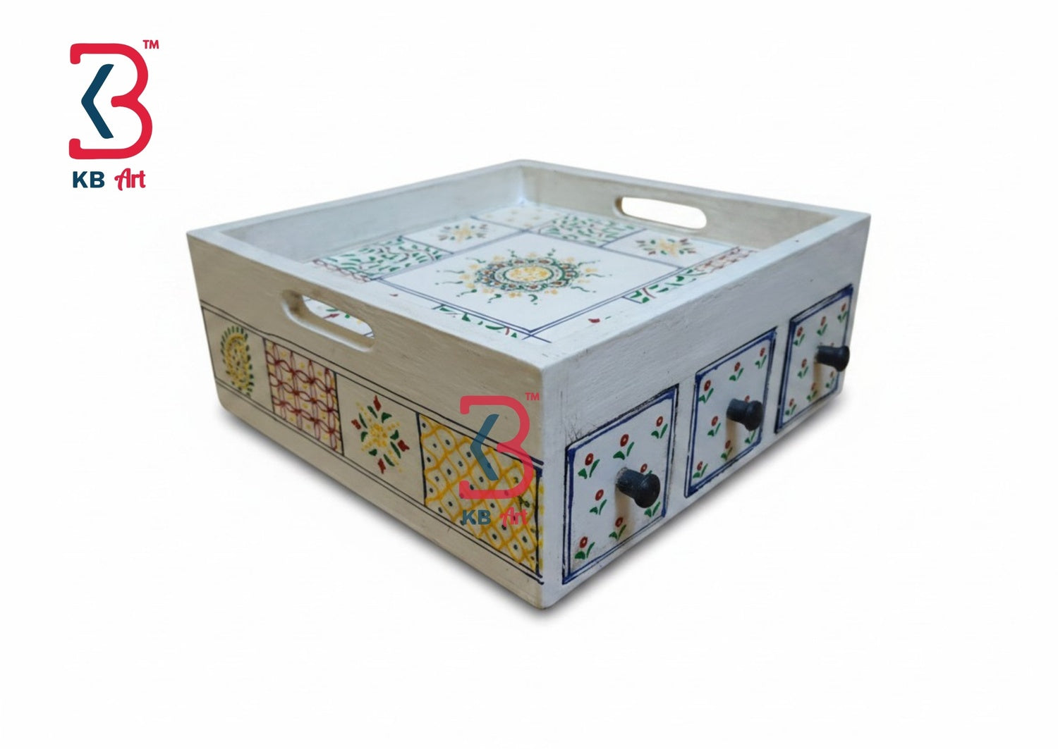 A rectangular wooden serving tray with cutout handles, decorated with colorful hand-painted floral and geometric patterns on the sides and a sun motif on the top. The tray is shown at an angle on a white background with a KB Art logo in the top-left corner.