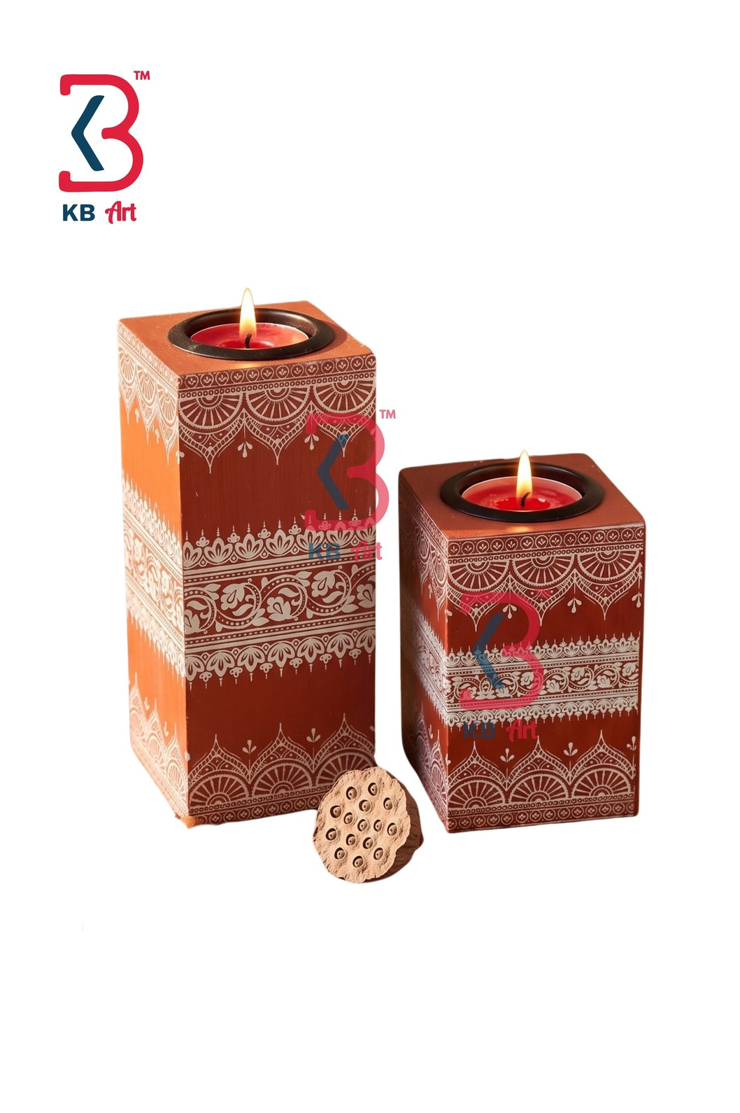 Real product photograph on a white background showing a set of 2 terracotta orange hand-painted wooden rectangular pillar tea-light holders by KB Art.