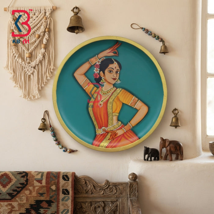 Round wooden wall plate with hand-painted Bharatanatyam classical dancer in orange saree on turquoise background with gold rim